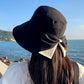 👒 💐 Women's Bowknot Wide Brim Sun Protective Hat – Oversized wide brim blocks UV rays, delicate bow decor, lightweight breathable fabric, ideal for beach, travel & outdoor walking✨